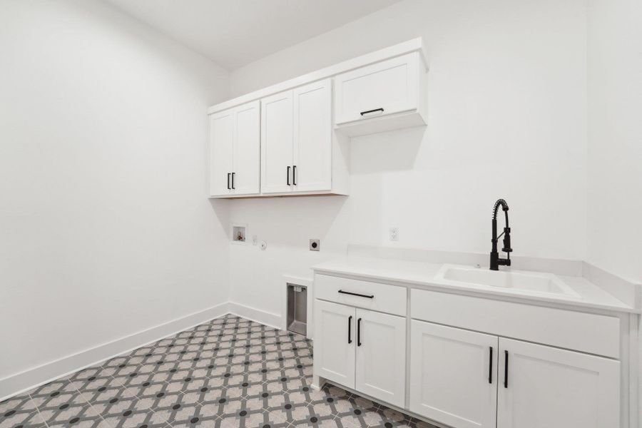 A separate laundry room makes everyday chores feel effortless. A separate laundry room makes everyday chores feel effortless.