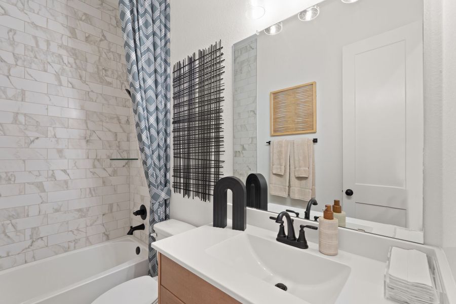 Furnished interior view inside a new home in Artavia, Conroe (Image 13).