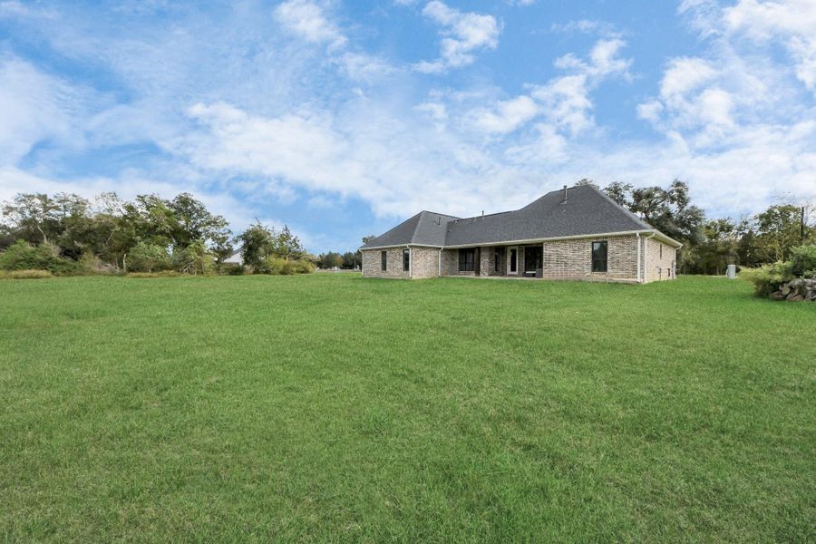Exterior details and patio area of a home in , Alvin (Image 4). Exterior details and patio area of a home in , Alvin (Image 4).