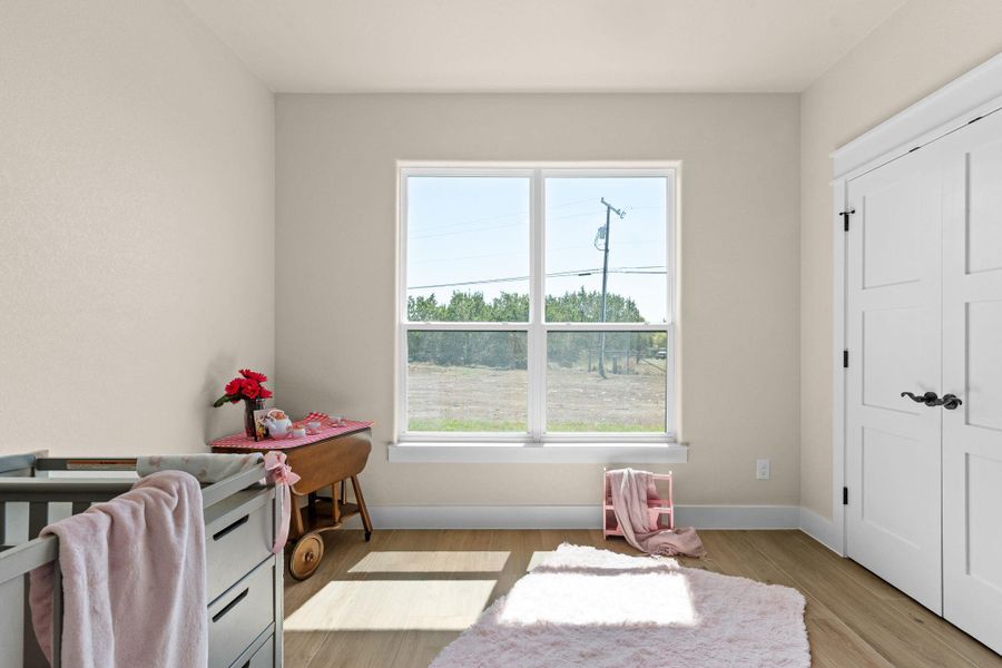 Rec room with light wood-style floors and baseboards Rec room with light wood-style floors and baseboards