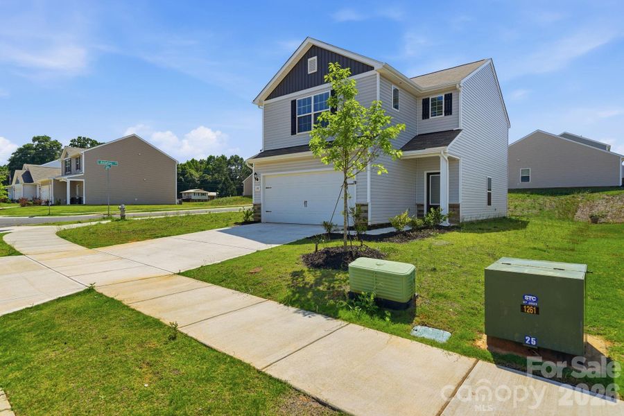 Front exterior of a new home in , Shelby, NC, highlighting curb appeal (Image 24).