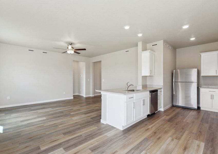 The family off is located off of the kitchen.