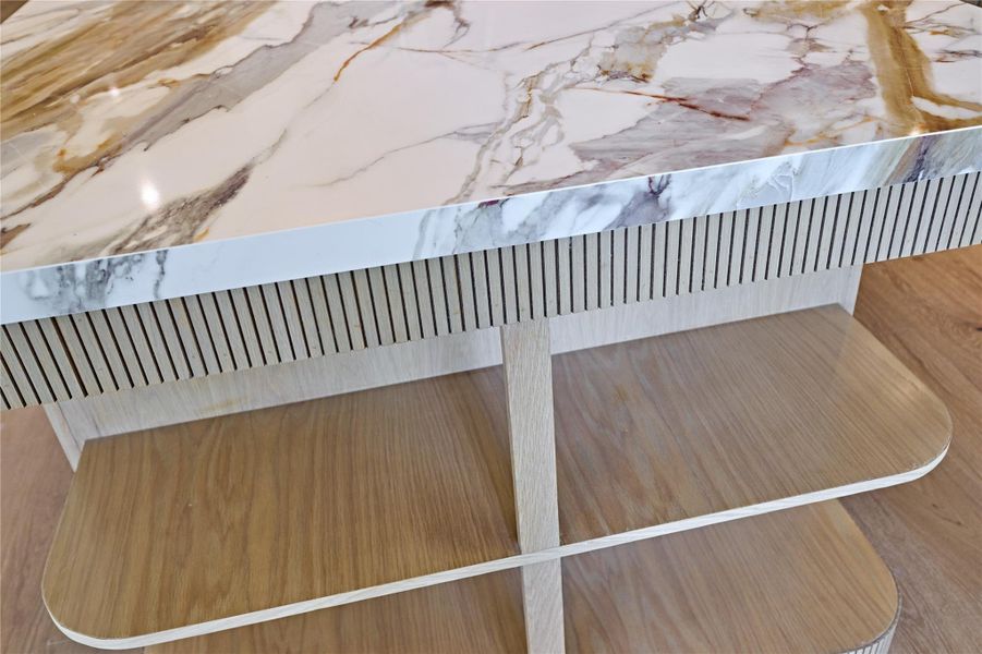 The island with shelving on both sides is a piece of functional art.