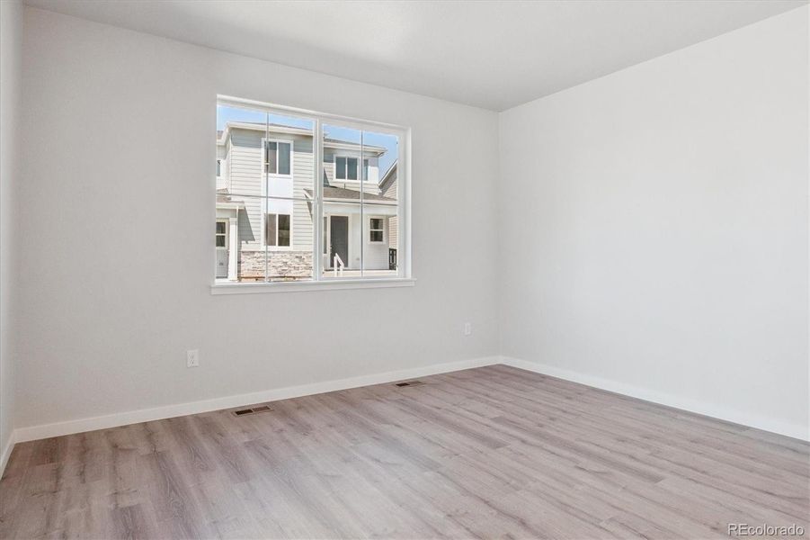 Spacious, unfurnished interior of a new home in Paired Homes at Alder Creek, Parker (Image 13).