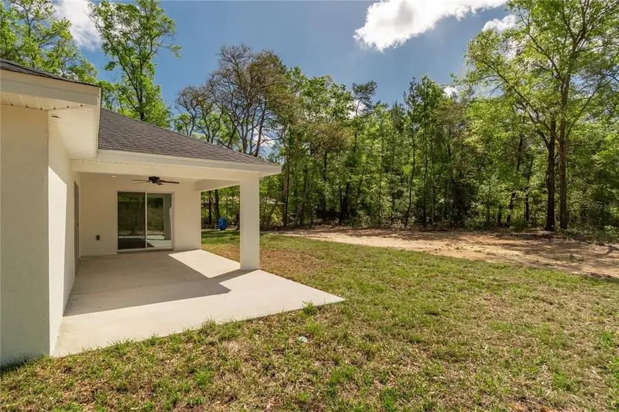 Exterior details and patio area of a home in , Ocala (Image 3).