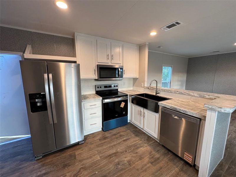 Furnished interior view inside a new home in , Granbury (Image 3).