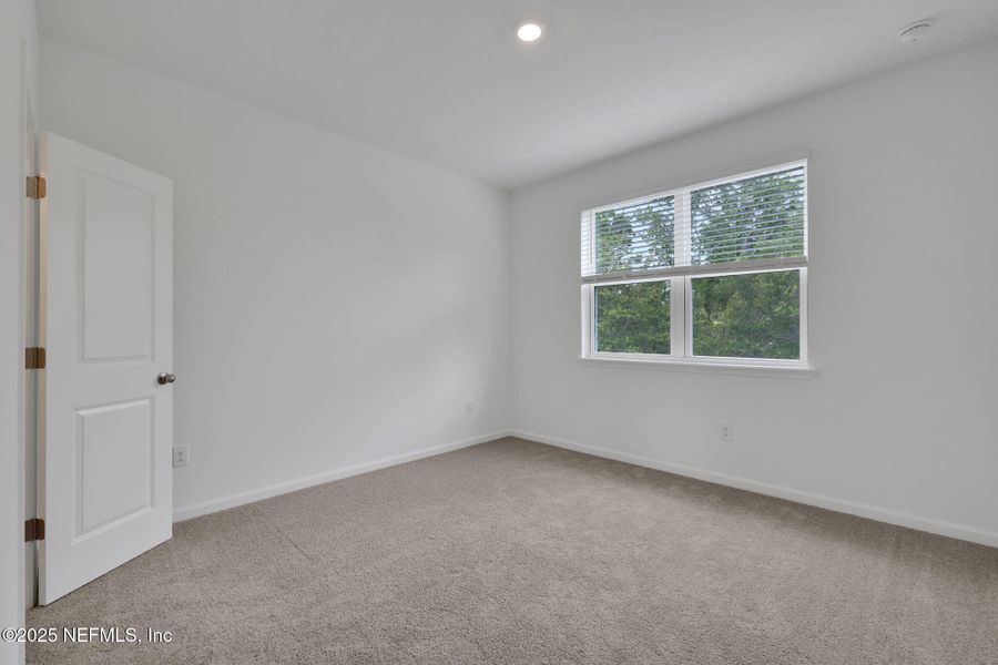 Spacious, unfurnished interior of a new home in The Hammock at Palm Harbor, Palm Coast (Image 15).