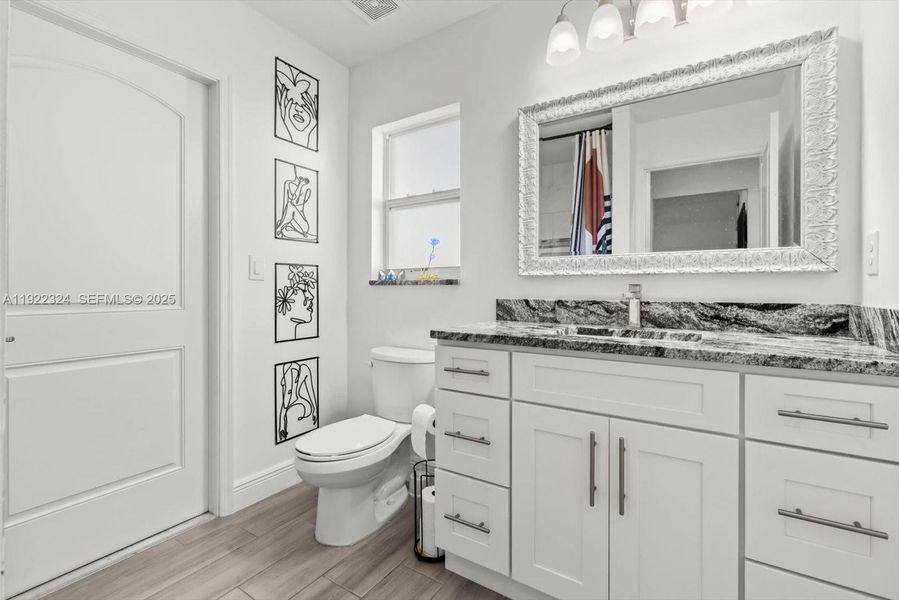 Furnished interior view inside a new home in , Port St. Lucie (Image 34).