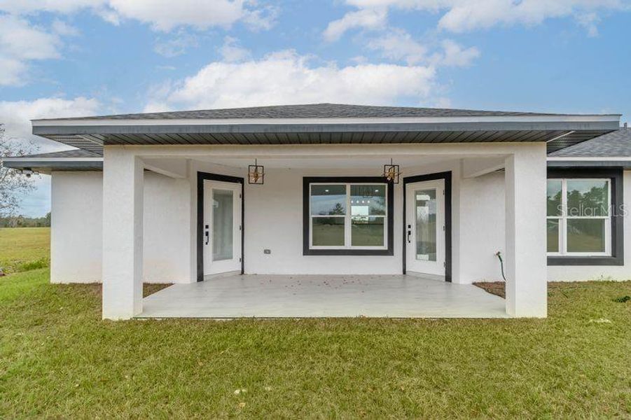 Exterior details and patio area of a home in , Morriston (Image 4).