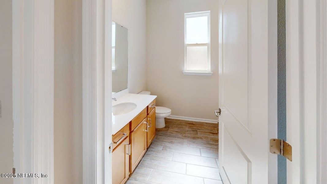 Furnished interior view inside a new home in Lakes at Bella Lago, Green Cove Springs (Image 5).