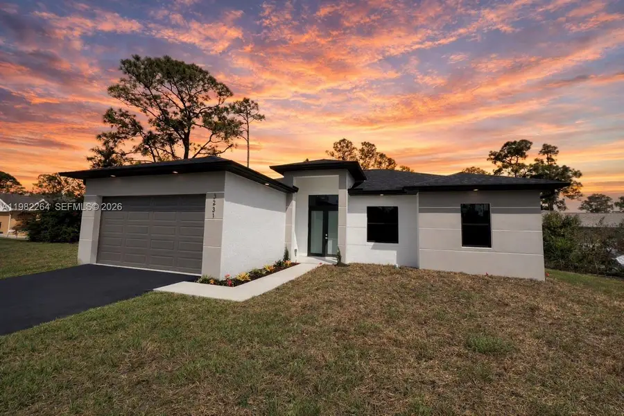 Front exterior of a new home in , Naples, FL, highlighting curb appeal (Image 1). Front exterior of a new home in , Naples, FL, highlighting curb appeal (Image 1).