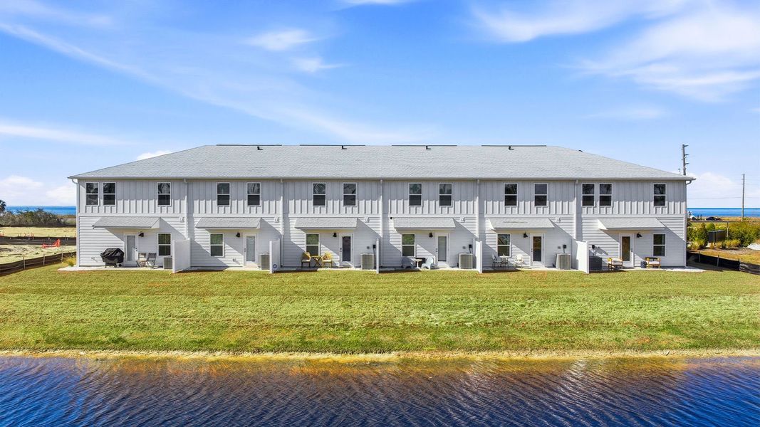 Exterior details and patio area of a home in WindMark Beach, Port Saint Joe (Image 3).