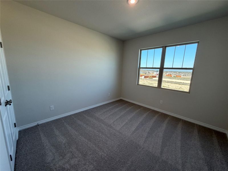 Spacious, unfurnished interior of a new home in Lariat, Liberty Hill (Image 24).