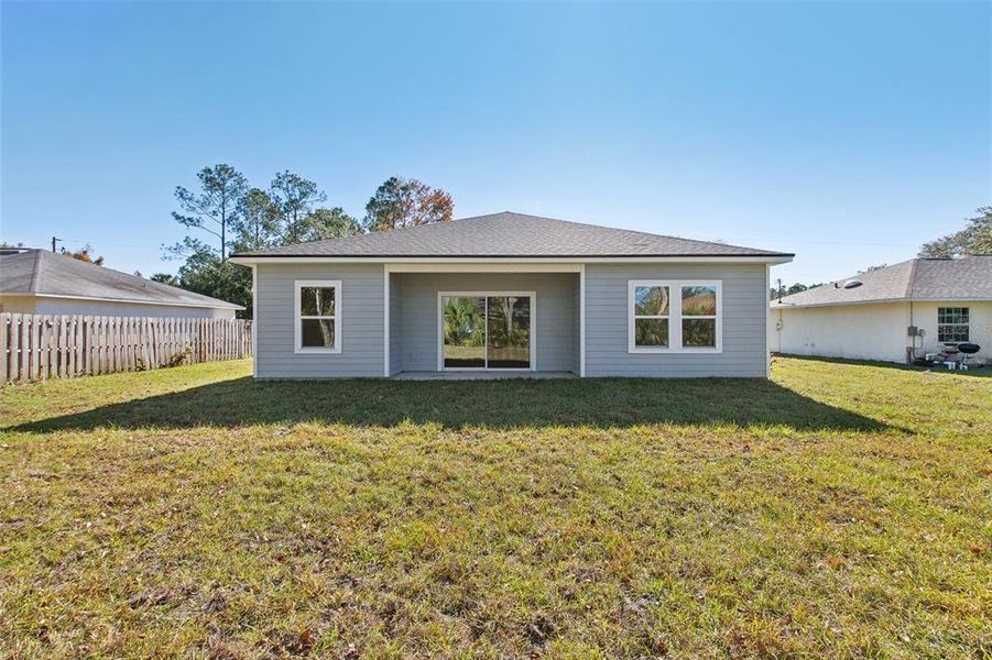Exterior details and patio area of a home in Palm Coast, Palm Coast (Image 19).