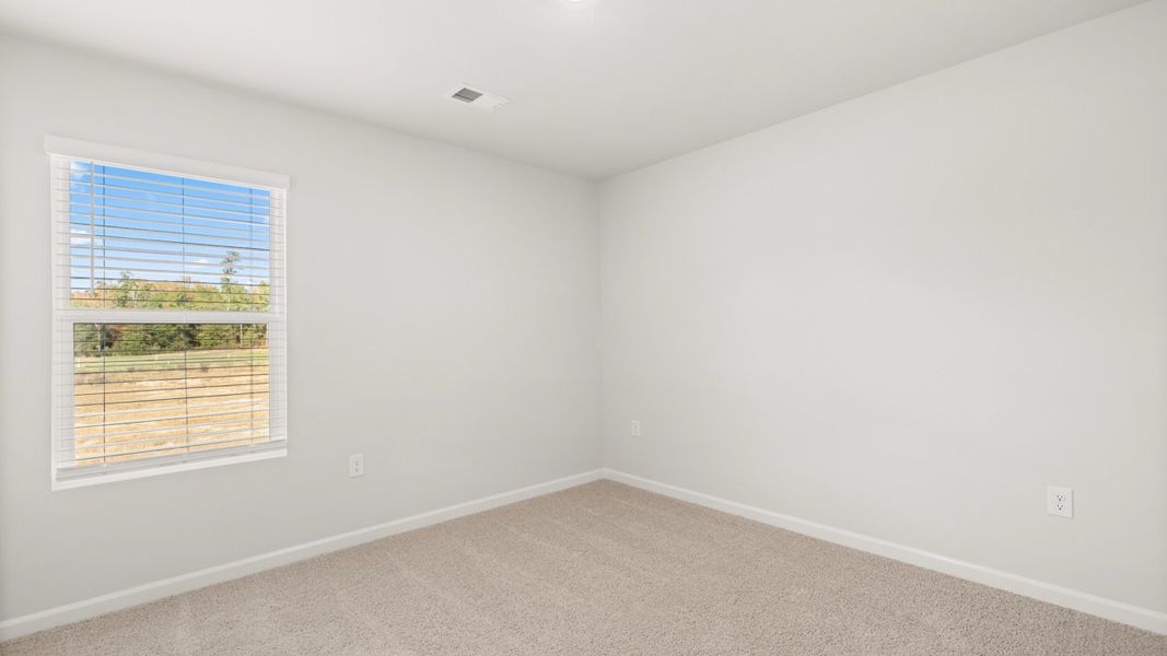 Representative unfurnished interior of a home built from the Somerset by D.R. Horton in Highland Hills, Graniteville (Image 22).