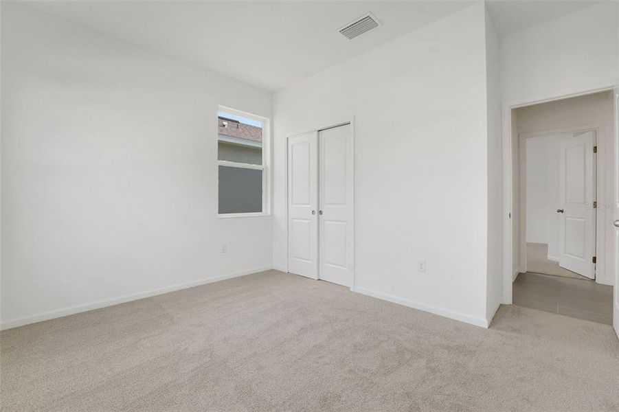 Spacious, unfurnished interior of a new home in Annabelle Estates, Winter Haven (Image 11).