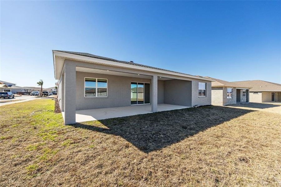 Exterior details and patio area of a home in Calesa Township, Ocala (Image 25).