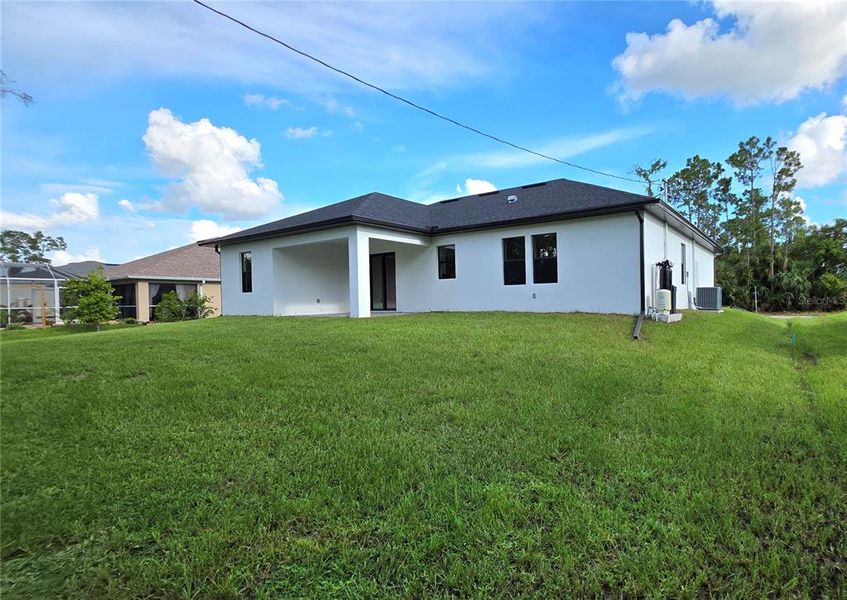 Front exterior of a new home in , North Port, FL, highlighting curb appeal (Image 10).