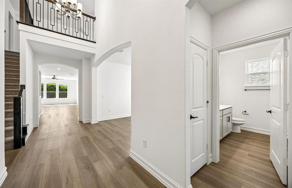 Entrance foyer with two story ceilings