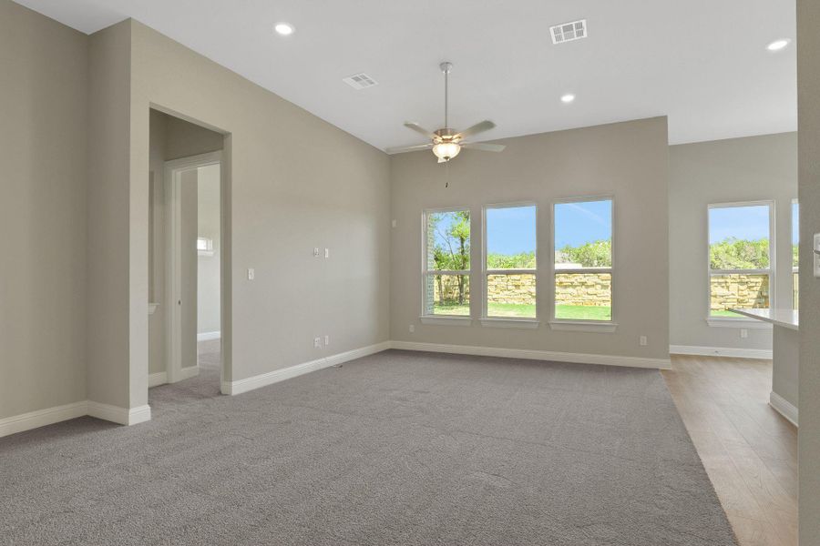 Spare room featuring visible vents, baseboards, a ceiling fan, and recessed lighting