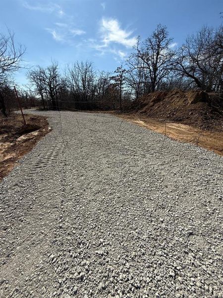 New gravel driveway. New gravel driveway.