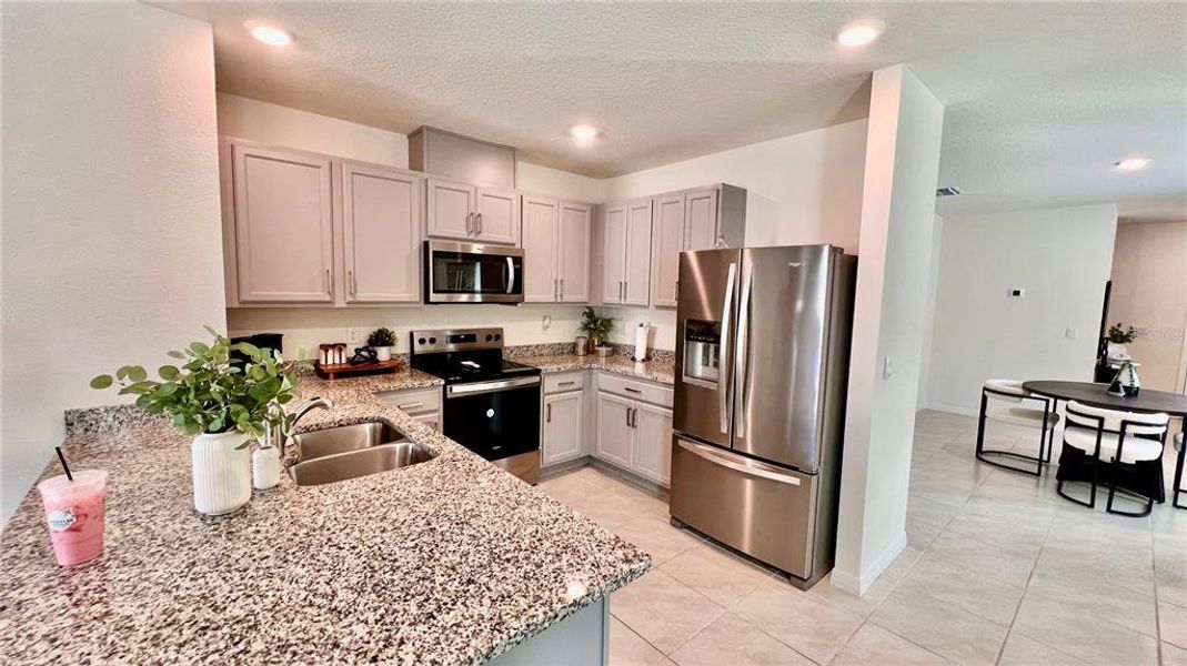 Furnished interior view inside a new home in Harmony West, St. Cloud (Image 5).