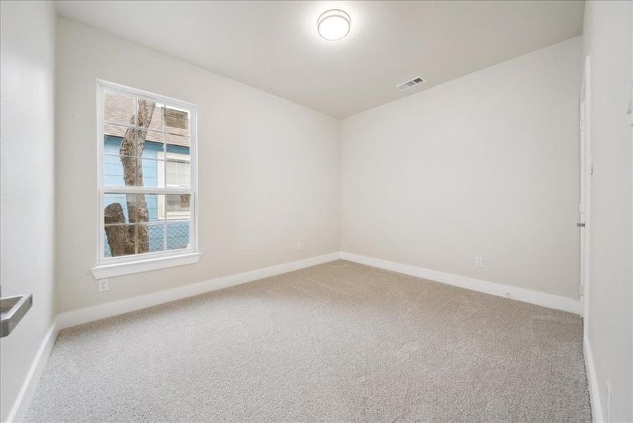 Empty room featuring carpet floors