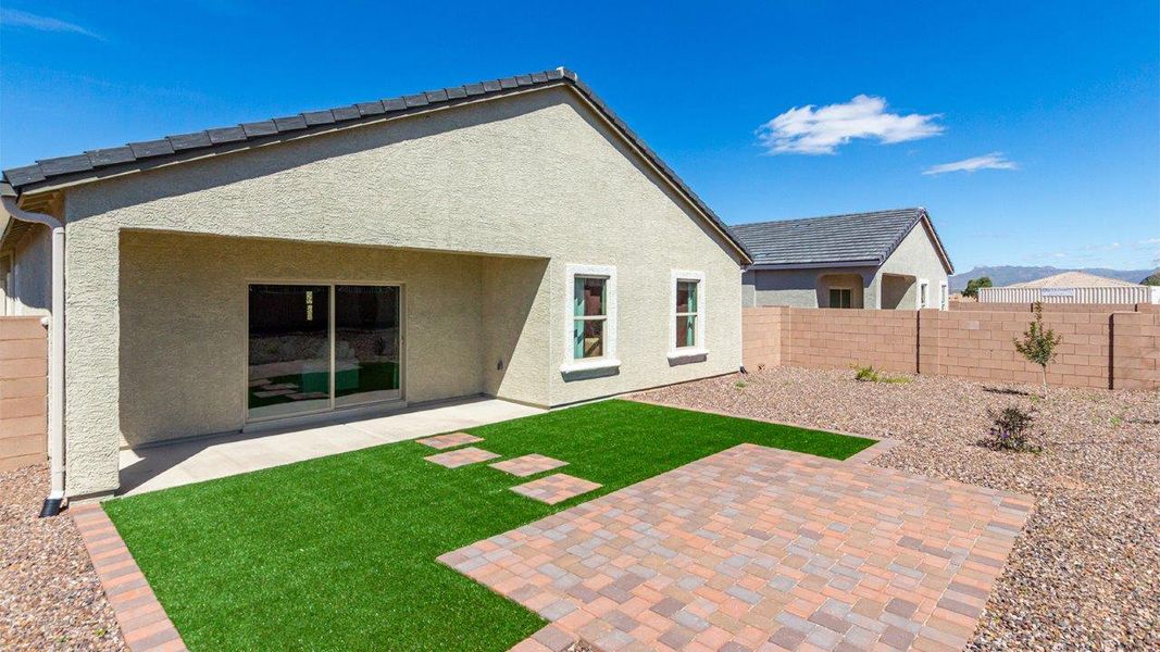 Front exterior of a new home in Saguaro Bloom, Marana, AZ, highlighting curb appeal (Image 19). Front exterior of a new home in Saguaro Bloom, Marana, AZ, highlighting curb appeal (Image 19).