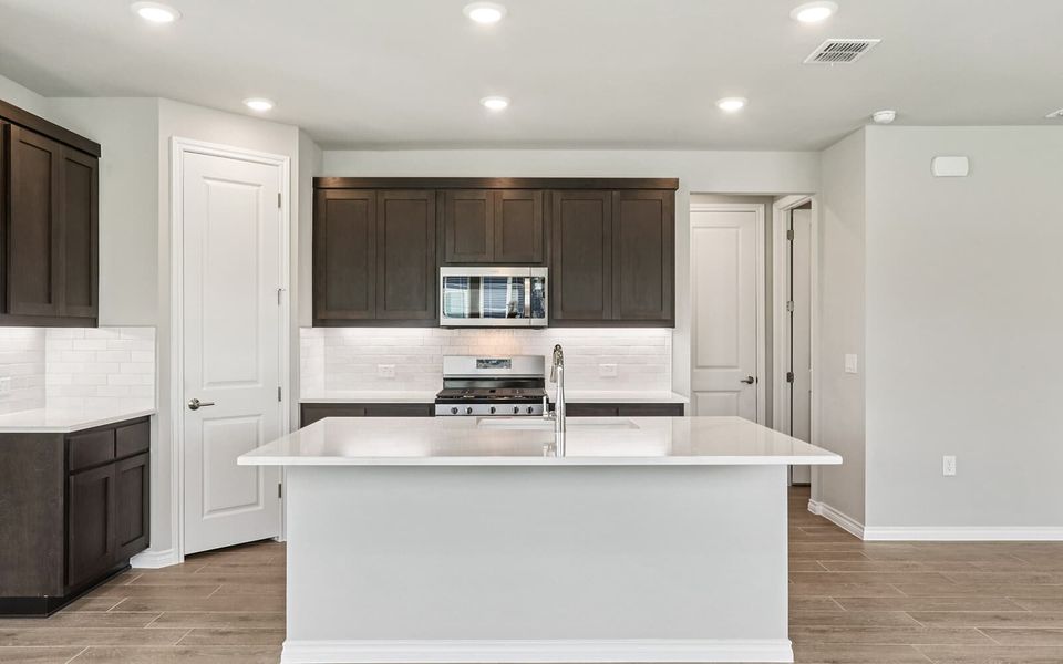 Furnished interior view inside a new home in Cottage at Kissing Tree, San Marcos (Image 4).