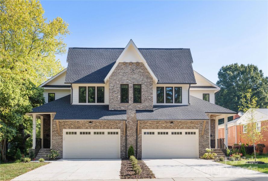 Front exterior of a new home in , Charlotte, NC, highlighting curb appeal (Image 1).