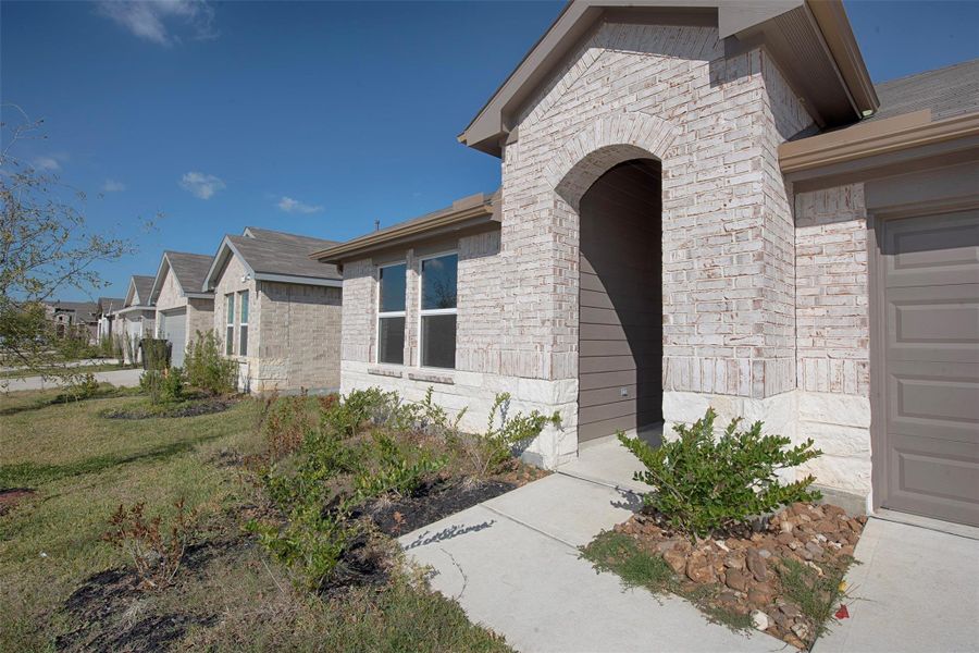 Great area surrounding the front porch to plant your favorite flowers in the Spring. Great area surrounding the front porch to plant your favorite flowers in the Spring.