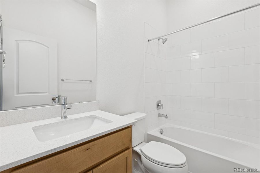 Furnished interior view inside a new home in Painted Prairie Cottage, Aurora (Image 7).