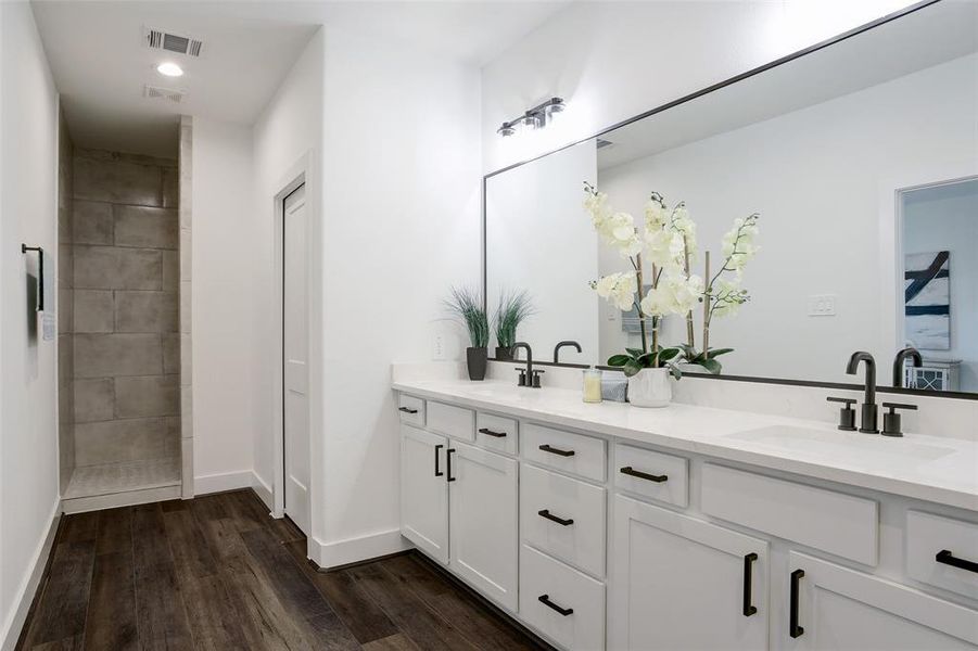 Primary bathroom with oversized shower.