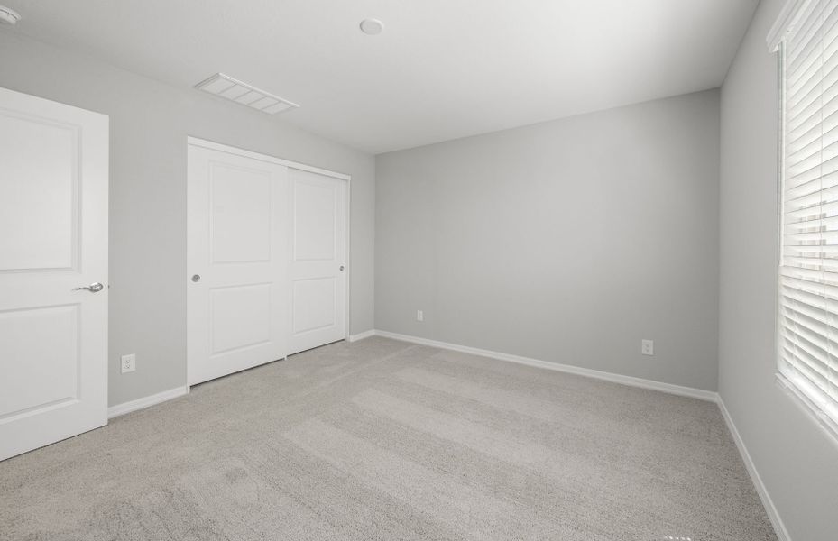 Spacious, unfurnished interior of a new home in Asante- Atrium Series, Surprise (Image 21).