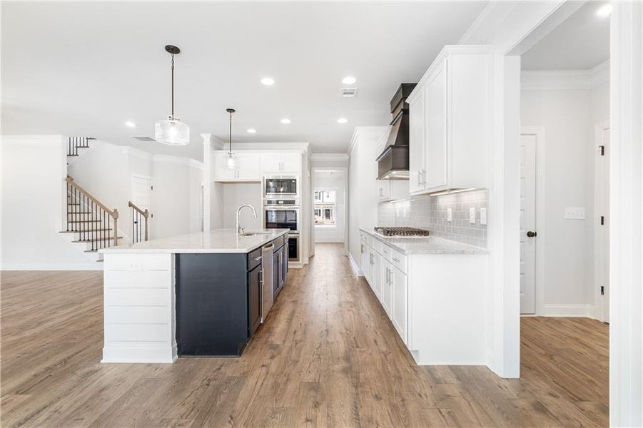 Furnished interior view inside a new home in Calgary Downs, Winder (Image 8).