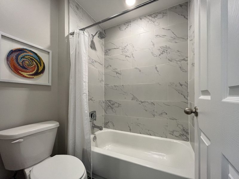 Furnished interior view inside a new home in Villas San Agustin, Laredo (Image 14).