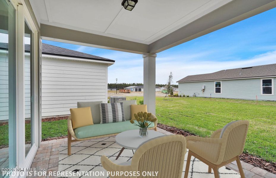 Exterior details and patio area of a home in Del Webb Wildlight, Yulee (Image 2).