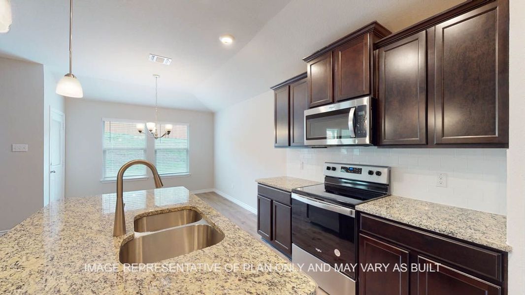 Furnished interior view inside a new home in Creekfall, Burnet (Image 3).