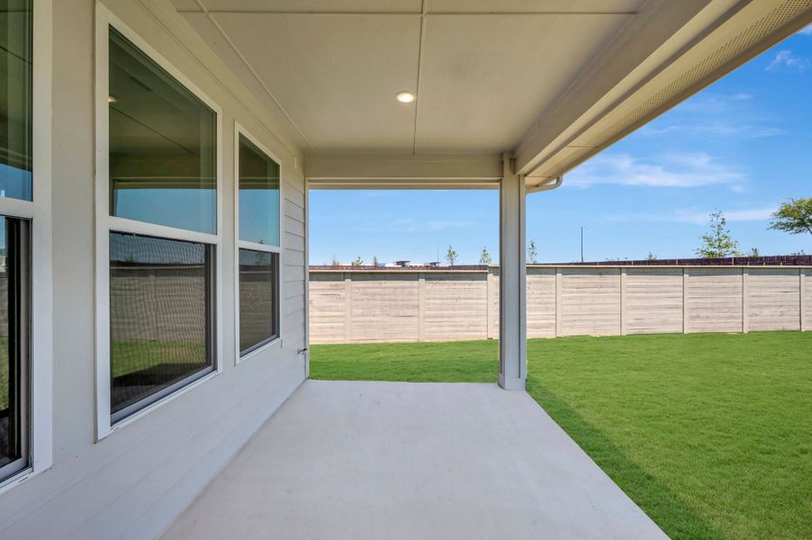Exterior details and patio area of a home in Landmark, Denton (Image 3).