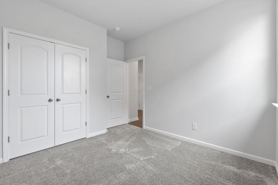 A room with white doors.