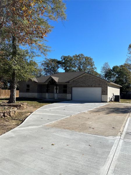 Front exterior of a new home in , Cleveland, TX, highlighting curb appeal (Image 1). Front exterior of a new home in , Cleveland, TX, highlighting curb appeal (Image 1).