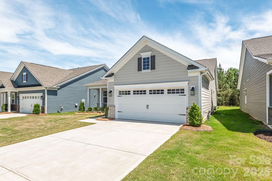 Front exterior of a new home in Esplanade at Northgate, Indian Trail, NC, highlighting curb appeal (Image 24).