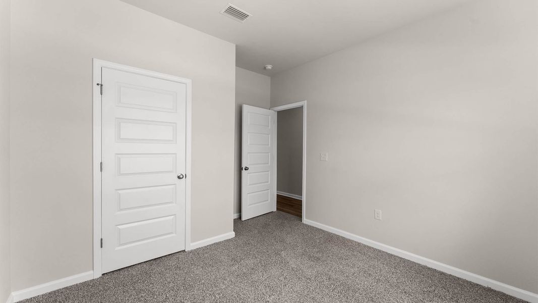 Representative unfurnished interior of a home built from the The Poppy by D.R. Horton in Liberty, Panama City (Image 16).