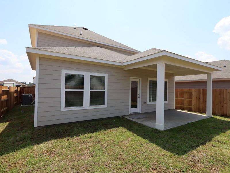 Front exterior of a new home in Indian Springs, Crosby, TX, highlighting curb appeal (Image 13).