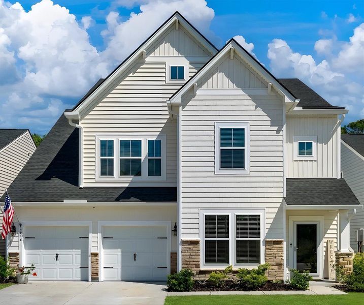 Front exterior of a new home in , Johns Island, SC, highlighting curb appeal (Image 27).