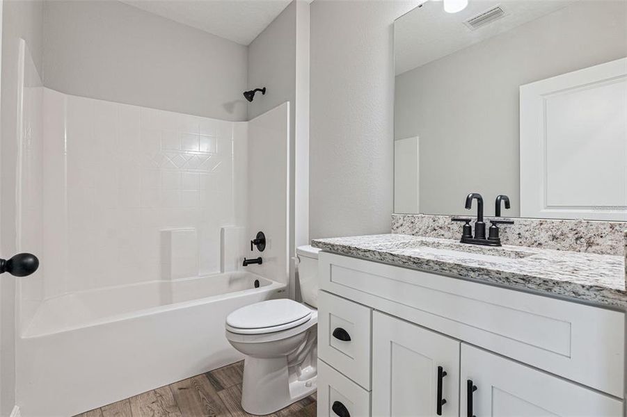 Furnished interior view inside a new home in , Deland (Image 3). Furnished interior view inside a new home in , Deland (Image 3).