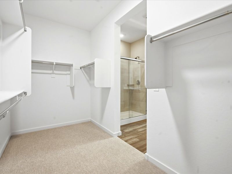Spacious, unfurnished interior of a new home in White Tank Foothills Signature Series, Waddell (Image 13).