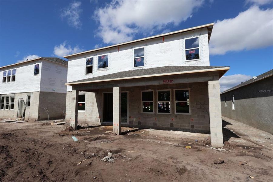 In-progress construction of a new home in Eden at Crossprairie, St. Cloud, FL (Image 18).
