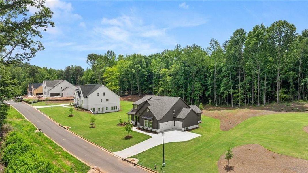 Front exterior of a new home in , Gainesville, GA, highlighting curb appeal (Image 20).