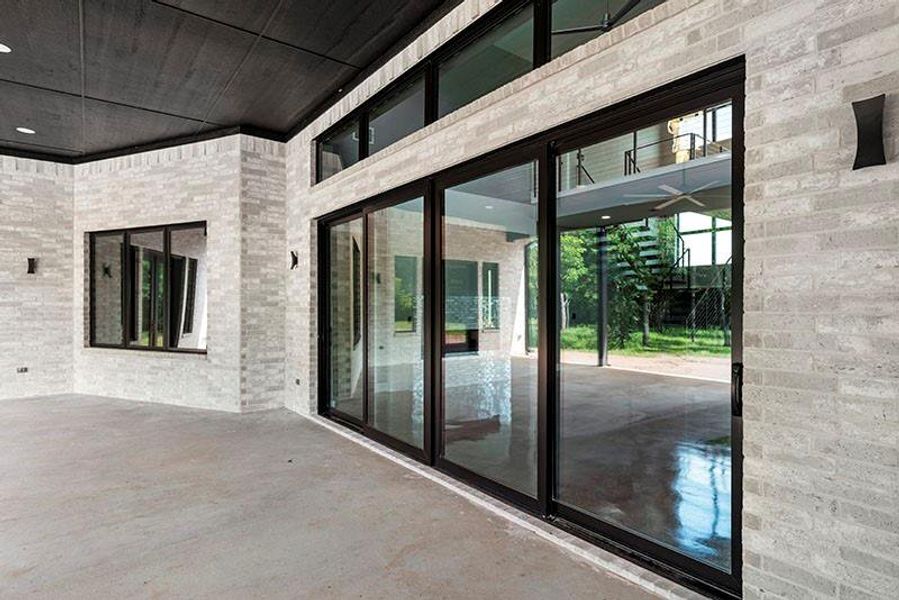 Exterior details and patio area of a home in , Sadler (Image 24).